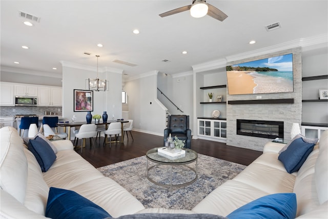 802 Malone St Unit A, Houston, TX 77007 - living room with wood finished floors, a chandelier, ceiling fan, recessed lighting, and a fireplace