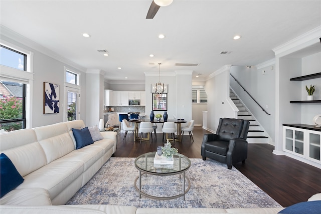 802 Malone St Unit A, Houston, TX 77007 - living room with crown molding, stairway, recessed lighting, dark wood-style flooring, and a chandelier