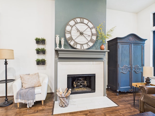 6003 Rivergrove Bend Dr, Humble, TX 77346 - sitting room featuring dark wood-type flooring and a fireplace