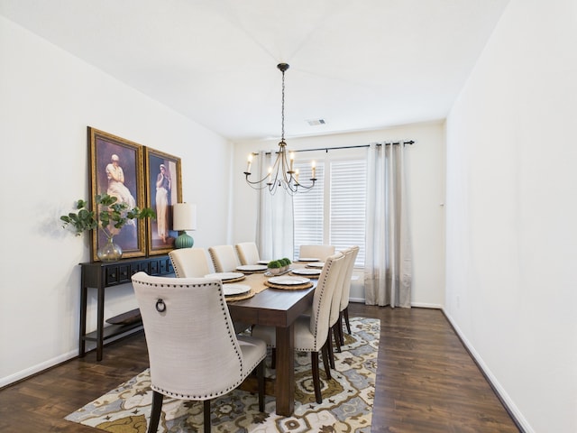 6003 Rivergrove Bend Dr, Humble, TX 77346 - dining space featuring a chandelier and dark wood-type flooring