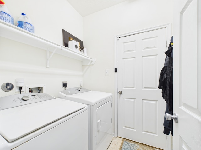 6003 Rivergrove Bend Dr, Humble, TX 77346 - washroom with washer and dryer and light tile patterned floors