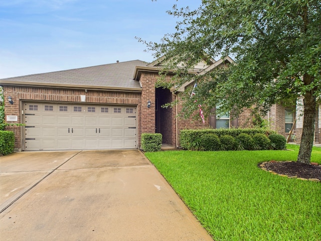 6003 Rivergrove Bend Dr, Humble, TX 77346 - ranch-style house with brick siding, concrete driveway, an attached garage, and a front yard