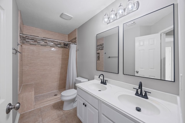 3307 La Seine Ln, Spring, TX 77388 - full bath featuring double vanity, a tile shower, and tile patterned floors