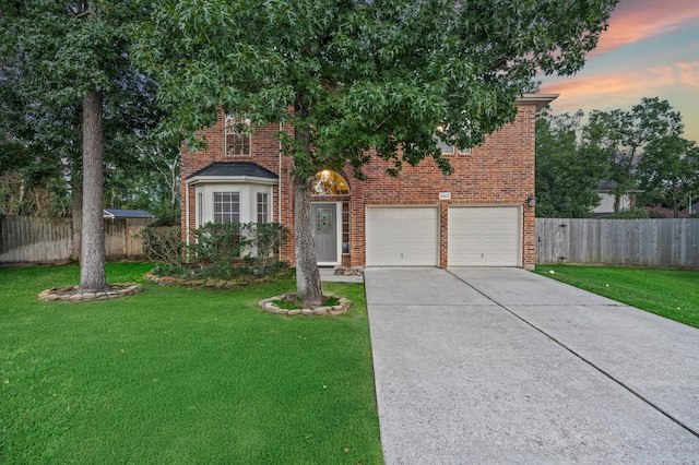 3307 La Seine Ln, Spring, TX 77388 - view of front of property featuring brick siding, driveway, and an attached garage