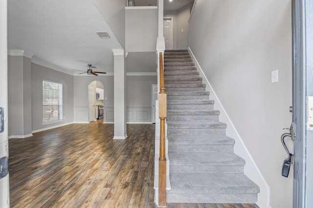 3307 La Seine Ln, Spring, TX 77388 - stairs featuring a ceiling fan, wood finished floors, arched walkways, and ornamental molding