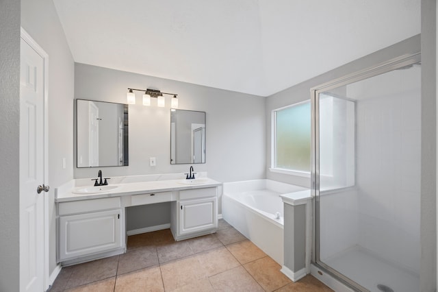 3307 La Seine Ln, Spring, TX 77388 - bathroom featuring a bath, double vanity, tile patterned floors, and a shower stall