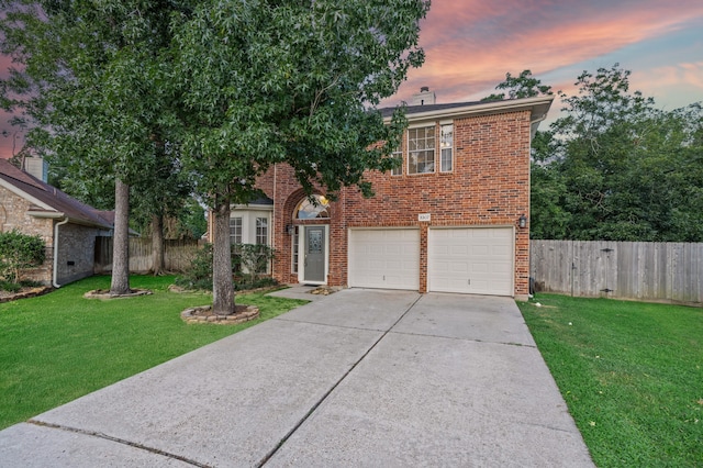 3307 La Seine Ln, Spring, TX 77388 - view of front of property with driveway, brick siding, and an attached garage