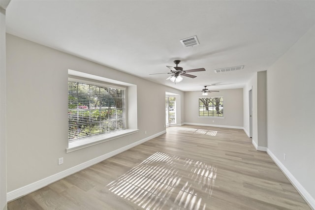 2915 Katy Hockley Rd, Katy, TX 77493 - unfurnished room with light wood finished floors and a ceiling fan