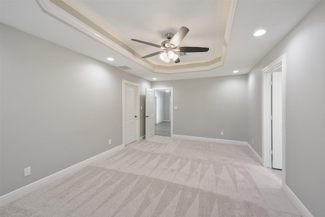 2915 Katy Hockley Rd, Katy, TX 77493 - unfurnished room featuring a ceiling fan, a raised ceiling, light colored carpet, and recessed lighting