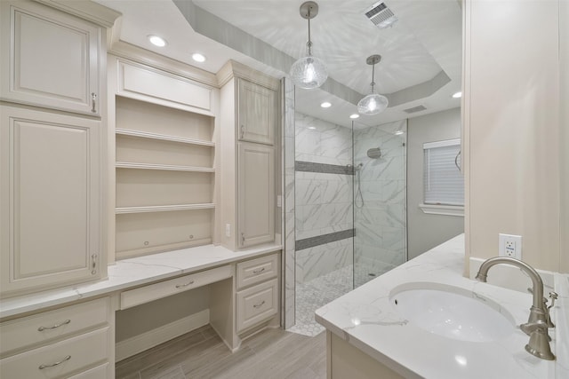 2915 Katy Hockley Rd, Katy, TX 77493 - full bathroom featuring a marble finish shower, wood finished floors, vanity, and recessed lighting