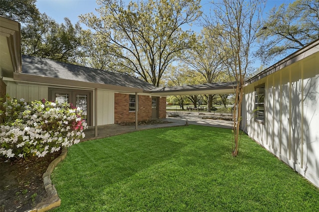 2915 Katy Hockley Rd, Katy, TX 77493 - view of grassy yard with a patio area
