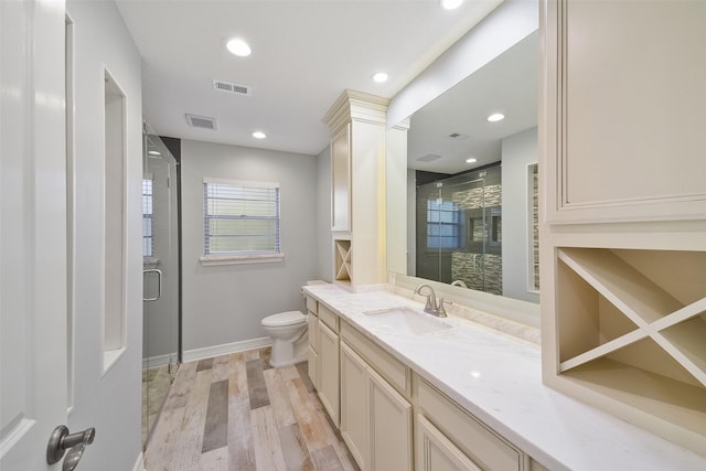 2915 Katy Hockley Rd, Katy, TX 77493 - full bathroom with a stall shower, vanity, wood finished floors, and recessed lighting