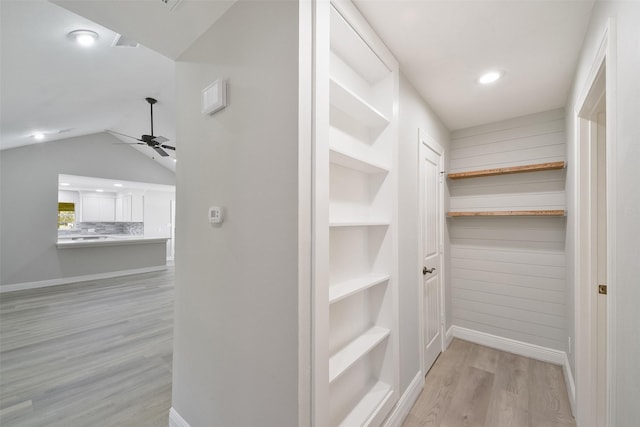 2915 Katy Hockley Rd, Katy, TX 77493 - walk in closet featuring ceiling fan, light wood-style floors, and vaulted ceiling