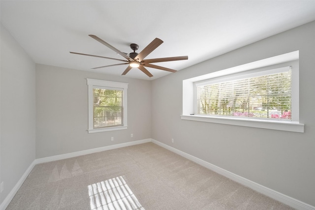 2915 Katy Hockley Rd, Katy, TX 77493 - unfurnished room featuring plenty of natural light, a ceiling fan, and carpet flooring