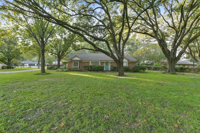 2915 Katy Hockley Rd, Katy, TX 77493 - single story home with a front yard and brick siding