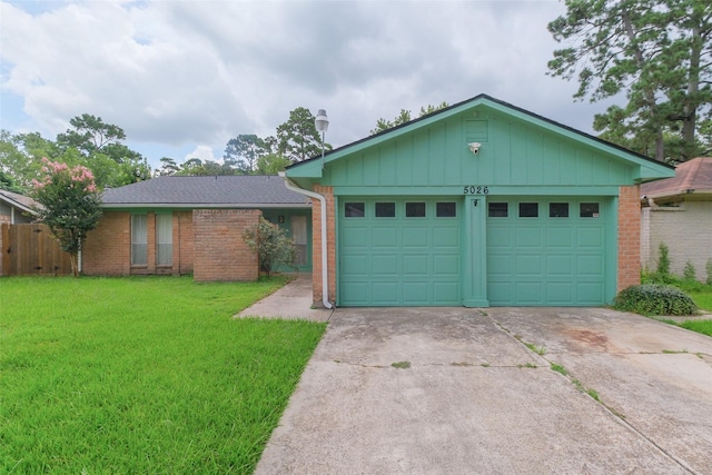 5026 Algernon Dr, Spring, TX 77373 - single story home with brick siding, concrete driveway, an attached garage, and a front lawn