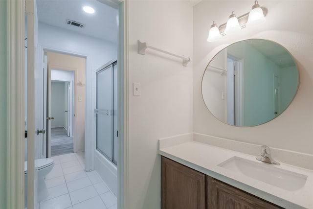 5026 Algernon Dr, Spring, TX 77373 - bathroom featuring vanity, tile patterned flooring, and combined bath / shower with glass door