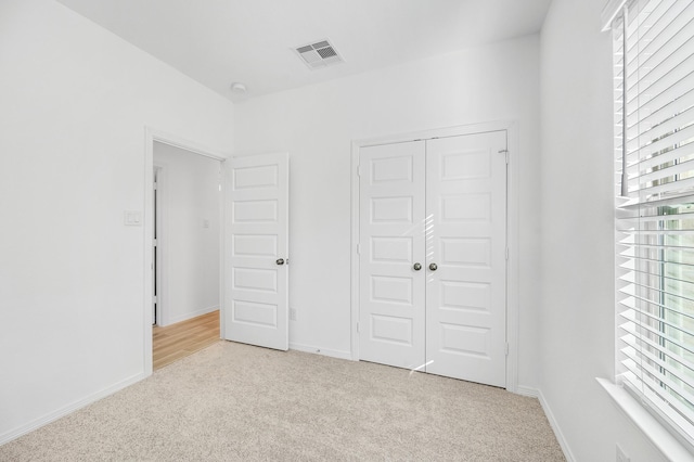 5630 Tabula Rasa Dr, Katy, TX 77493 - unfurnished bedroom featuring carpet flooring and a closet