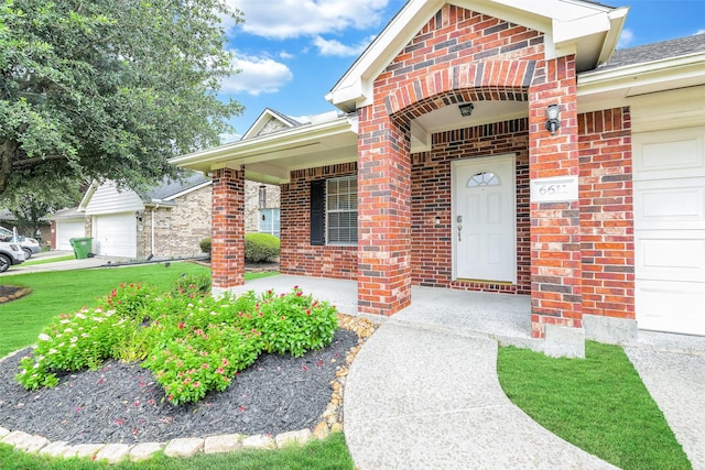 6611 Atasca Creek Dr, Humble, TX 77346 - entrance to property with brick siding, an attached garage, a porch, and a lawn