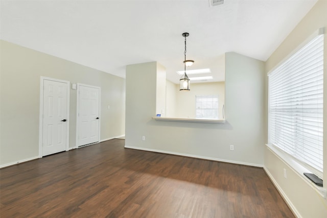 6611 Atasca Creek Dr, Humble, TX 77346 - unfurnished living room with dark wood-type flooring and baseboards