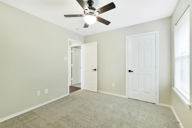 6611 Atasca Creek Dr, Humble, TX 77346 - unfurnished bedroom with carpet flooring and a ceiling fan