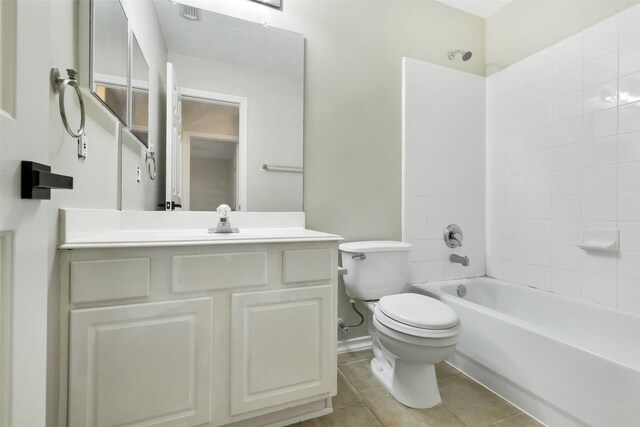 6611 Atasca Creek Dr, Humble, TX 77346 - full bathroom featuring tile patterned floors, vanity, and bathing tub / shower combination