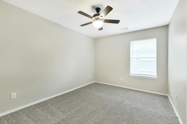 6611 Atasca Creek Dr, Humble, TX 77346 - carpeted empty room with baseboards and ceiling fan