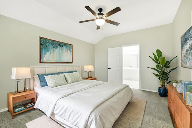 6611 Atasca Creek Dr, Humble, TX 77346 - bedroom featuring carpet flooring, lofted ceiling, connected bathroom, and a ceiling fan
