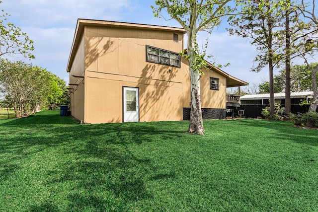 6302 Amie Ln, Pearland, TX 77584 - back of house with a lawn
