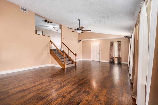 6302 Amie Ln, Pearland, TX 77584 - unfurnished living room featuring a textured ceiling, stairway, ceiling fan, lofted ceiling, and hardwood / wood-style floors
