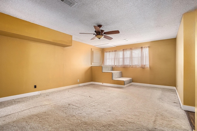 6302 Amie Ln, Pearland, TX 77584 - carpeted empty room with a textured ceiling and ceiling fan