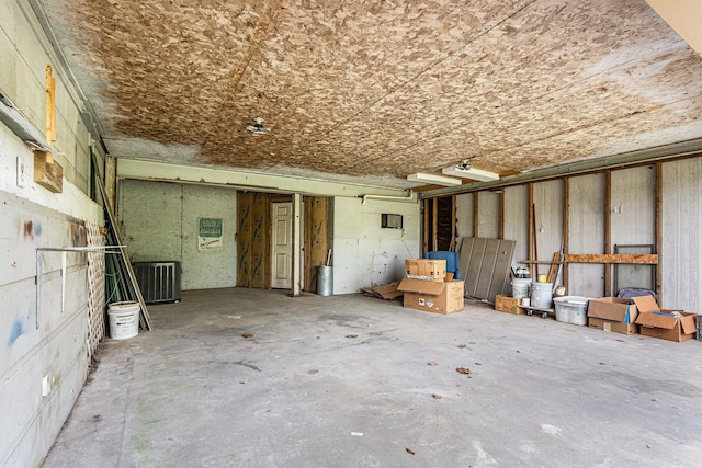 6302 Amie Ln, Pearland, TX 77584 - misc room with a garage and unfinished concrete floors