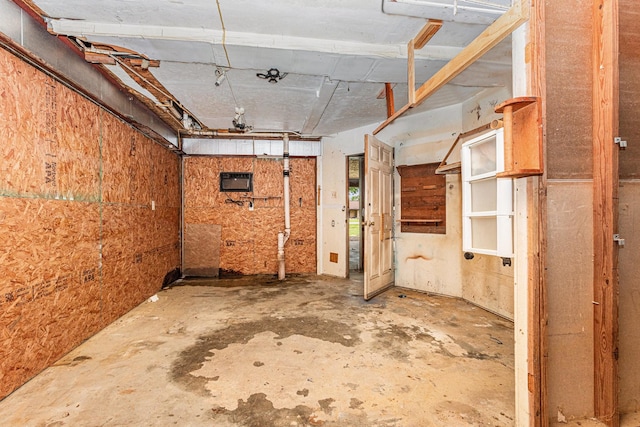 6302 Amie Ln, Pearland, TX 77584 - miscellaneous room featuring unfinished concrete flooring