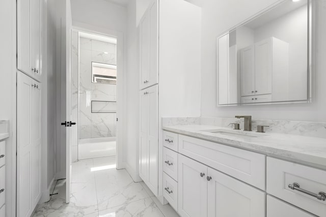 408 E 33rd St, Houston, TX 77018 - full bathroom featuring vanity, marble look tile flooring, and  shower combination