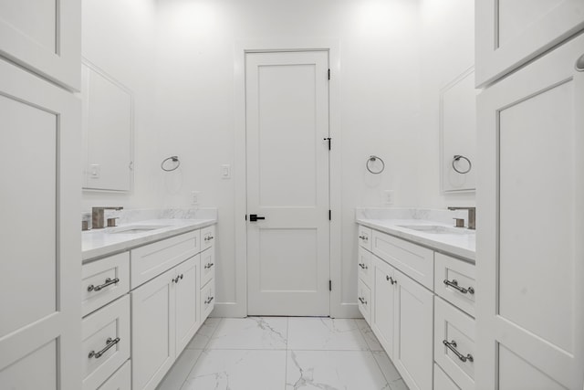 408 E 33rd St, Houston, TX 77018 - bathroom featuring marble finish floors and two vanities