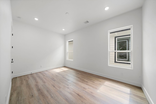 408 E 33rd St, Houston, TX 77018 - unfurnished room featuring light wood finished floors, recessed lighting, and a smoke detector