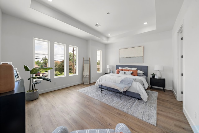408 E 33rd St, Houston, TX 77018 - bedroom with a raised ceiling, wood finished floors, and recessed lighting