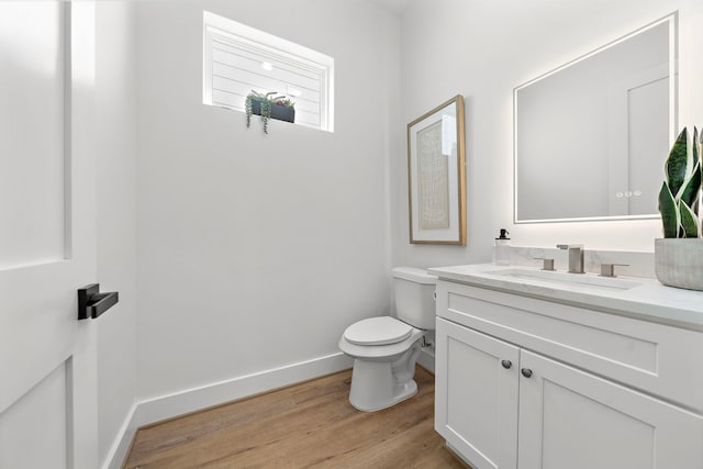 408 E 33rd St, Houston, TX 77018 - half bathroom with vanity and wood finished floors