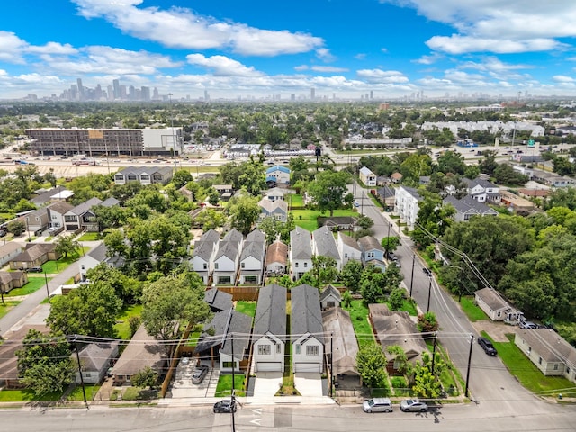 408 E 33rd St, Houston, TX 77018 - aerial perspective of suburban area with city skyline