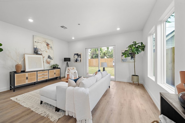 408 E 33rd St, Houston, TX 77018 - living room featuring light wood-style flooring and recessed lighting