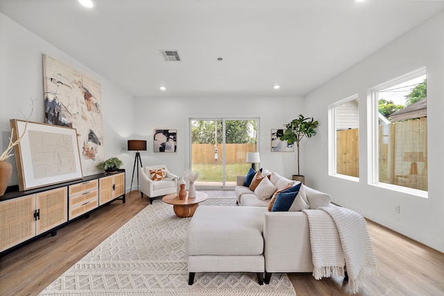 408 E 33rd St, Houston, TX 77018 - living room featuring wood finished floors and recessed lighting