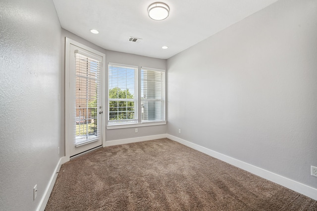 4106 Kolb St, Houston, TX 77007 - unfurnished room featuring carpet and recessed lighting