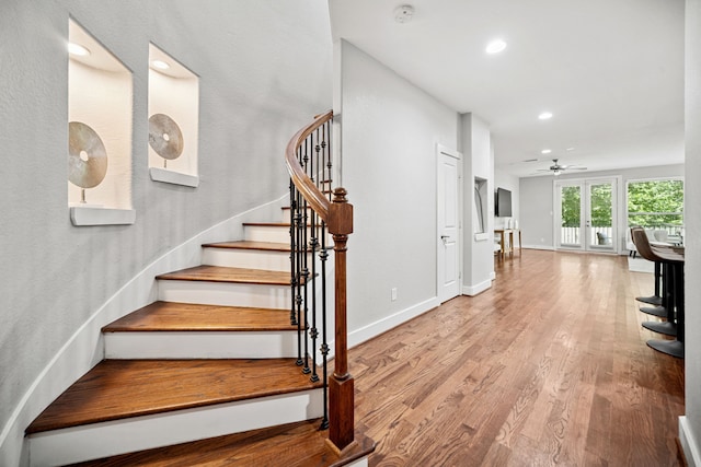 4106 Kolb St, Houston, TX 77007 - stairway with a ceiling fan, wood finished floors, and recessed lighting
