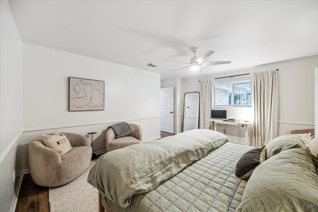 735 Rennie Dr, Katy, TX 77450 - bedroom with wood finished floors and a ceiling fan