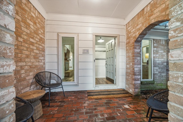 735 Rennie Dr, Katy, TX 77450 - view of exterior entry featuring brick siding