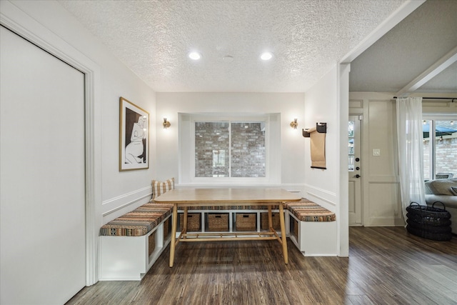 735 Rennie Dr, Katy, TX 77450 - unfurnished dining area with wood finished floors, a textured ceiling, and recessed lighting