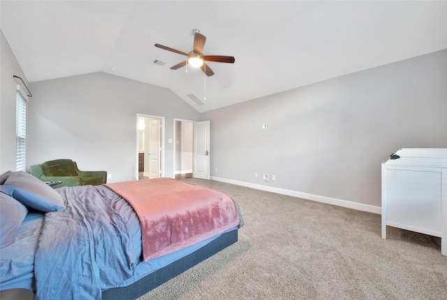 15715 Holloway Creek Ct, Houston, TX 77044 - carpeted bedroom with vaulted ceiling, ceiling fan, and ensuite bath