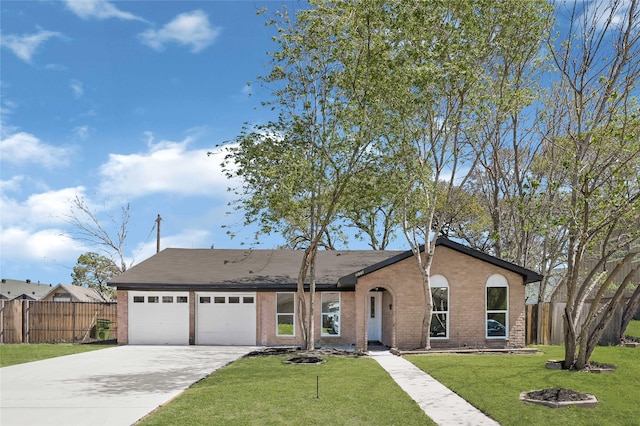 11807 Oceanview St, Missouri City, TX 77071 - ranch-style house featuring a garage, driveway, and brick siding