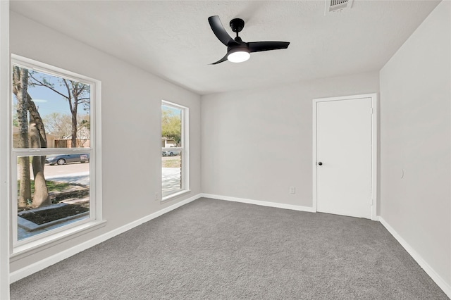 11807 Oceanview St, Missouri City, TX 77071 - carpeted spare room with ceiling fan and baseboards