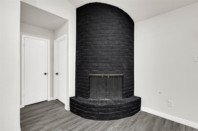 11807 Oceanview St, Missouri City, TX 77071 - detailed view of wood finished floors and a fireplace